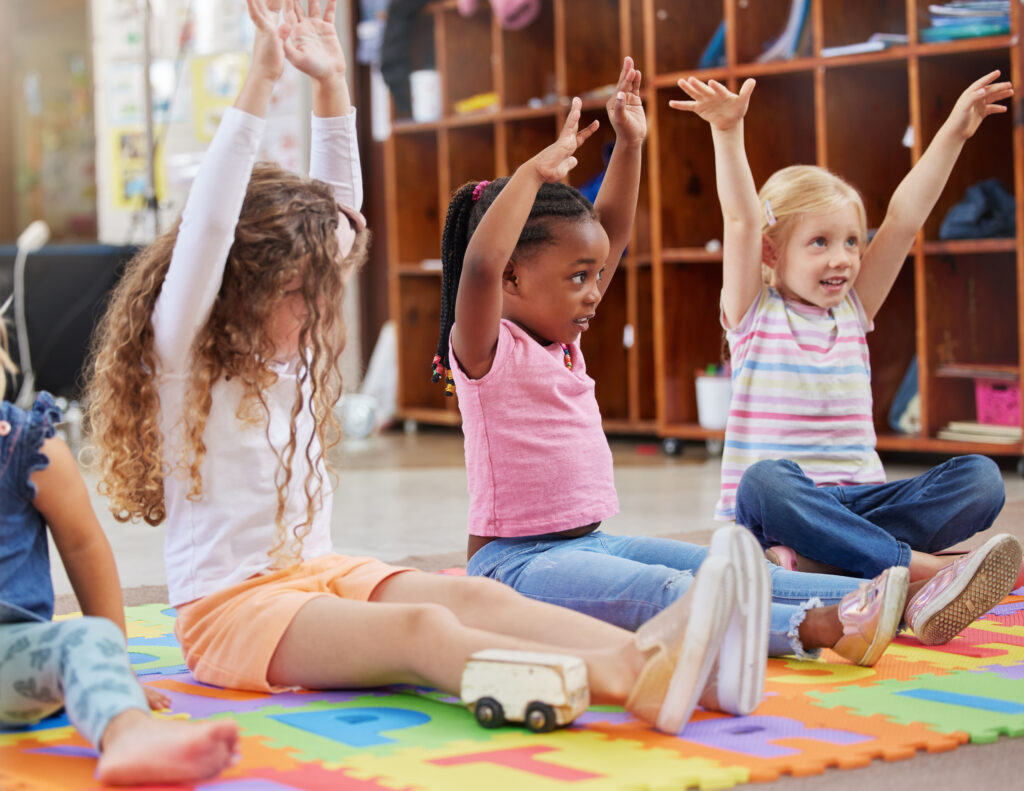 Children participating in an after-school program, engaged in activities and learning together