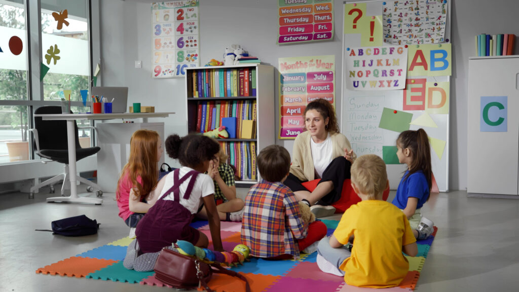 Group of children in an after-school tutoring program engaging in creative learning activities beyond traditional school standards.